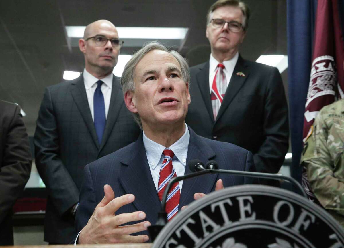 Gov. Greg Abbott answers media questions on coronavirus as he and Lt. Gov. Dan Patrick meet with public officials at the State Operations Center in Austin on Feb. 27, 2020.