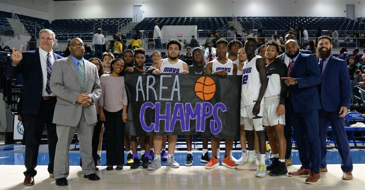 The Morton Ranch Mavericks celebrate their 71-51 victory over the Sam Houston Tigers in a Boys 6A Region III Area round play-off game on Thursday, February 27, 2020 at Delmar Fieldhouse, Houston, TX.