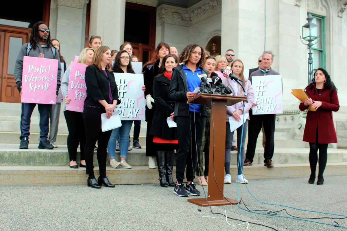 Danbury High School sophomore Alanna Smith speaks during a news conference at the Connecticut State Capitol in Hartford, Conn., Tuesday, Feb, 12, 2020. Smith, the daughter of former Major League pitcher Lee Smith, is among three girls suing to block a state policy that allows transgender athletes to compete in girls sports.