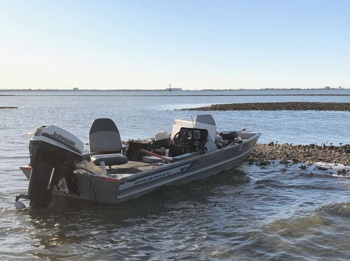 An unmanned boat washed ashore in Galveston just south of Tiki Island on Friday, Feb. 28, 2020.