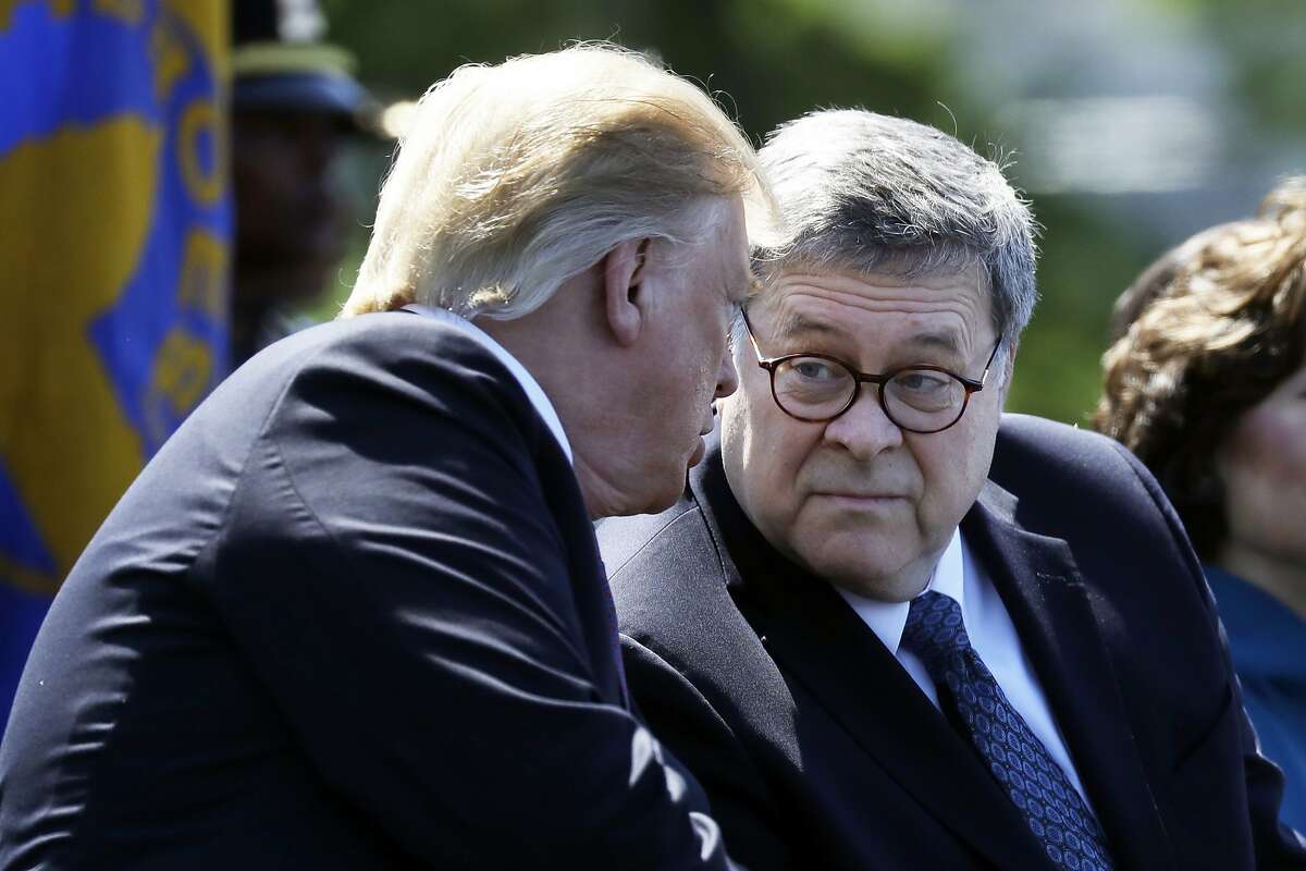 In this May 15, 2019 file photo, President Donald Trump and Attorney General William Barr attend the 38th Annual National Peace Officers' Memorial Service at the U.S. Capitol in Washington. The House Judiciary Committee is launching a wide-ranging probe of Attorney General William Barr and the Justice Department, demanding briefings, documents and interviews with 15 officials about whether there has been improper political interference in federal law enforcement.