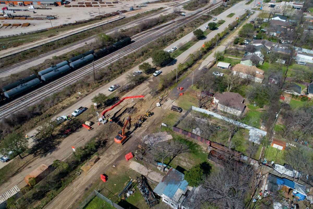 Work is ongoing at the site of a water main break, Friday, Feb. 28, 2020, along Clinton Drive between Pennsylvania and North Carolina streets in Houston. When the break occurred Thursday afternoon, 610 East had to be shut down in both directions.