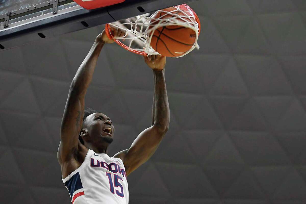 Connecticut's Sidney Wilson dunks in the second half of an NCAA college basketball game, Wednesday, Dec. 4, 2019, in Storrs, Conn. (AP Photo/Jessica Hill)