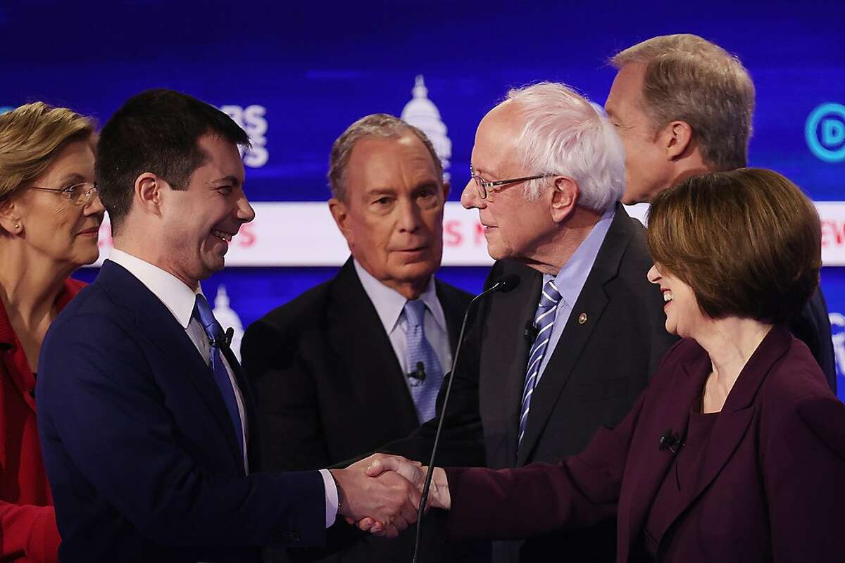CHARLESTON, SOUTH CAROLINA - FEBRUARY 25: Democratic presidential candidates Sen. Elizabeth Warren (D-MA), former South Bend, Indiana Mayor Pete Buttigieg, former New York City Mayor Mike Bloomberg, Sen. Bernie Sanders (I-VT), Sen. Amy Klobuchar (D-MN), and Tom Steyer speak after the Democratic presidential primary debate at the Charleston Gaillard Center on February 25, 2020 in Charleston, South Carolina. Seven candidates qualified for the debate, hosted by CBS News and Congressional Black Caucus Institute, ahead of South Carolinas primary in four days. (Photo by Win McNamee/Getty Images) *** BESTPIX ***
