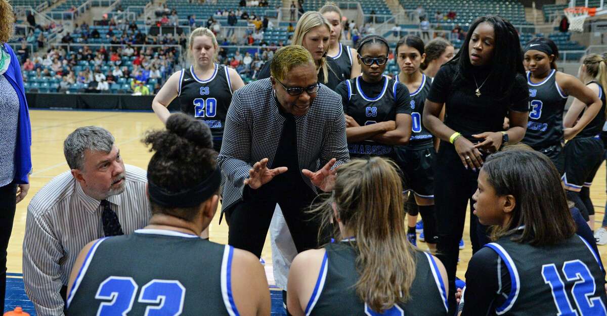 Clear Springs Head Coach Pamela Crawford talks to her team during a time out late in the fourth quarter of a Girls 6A Region III semifinal play-off game between the Ridge Point Panthers and the Clear Springs Chargers on Friday, February 28, 2020 at the Leonard Merrell Center, Katy, TX.