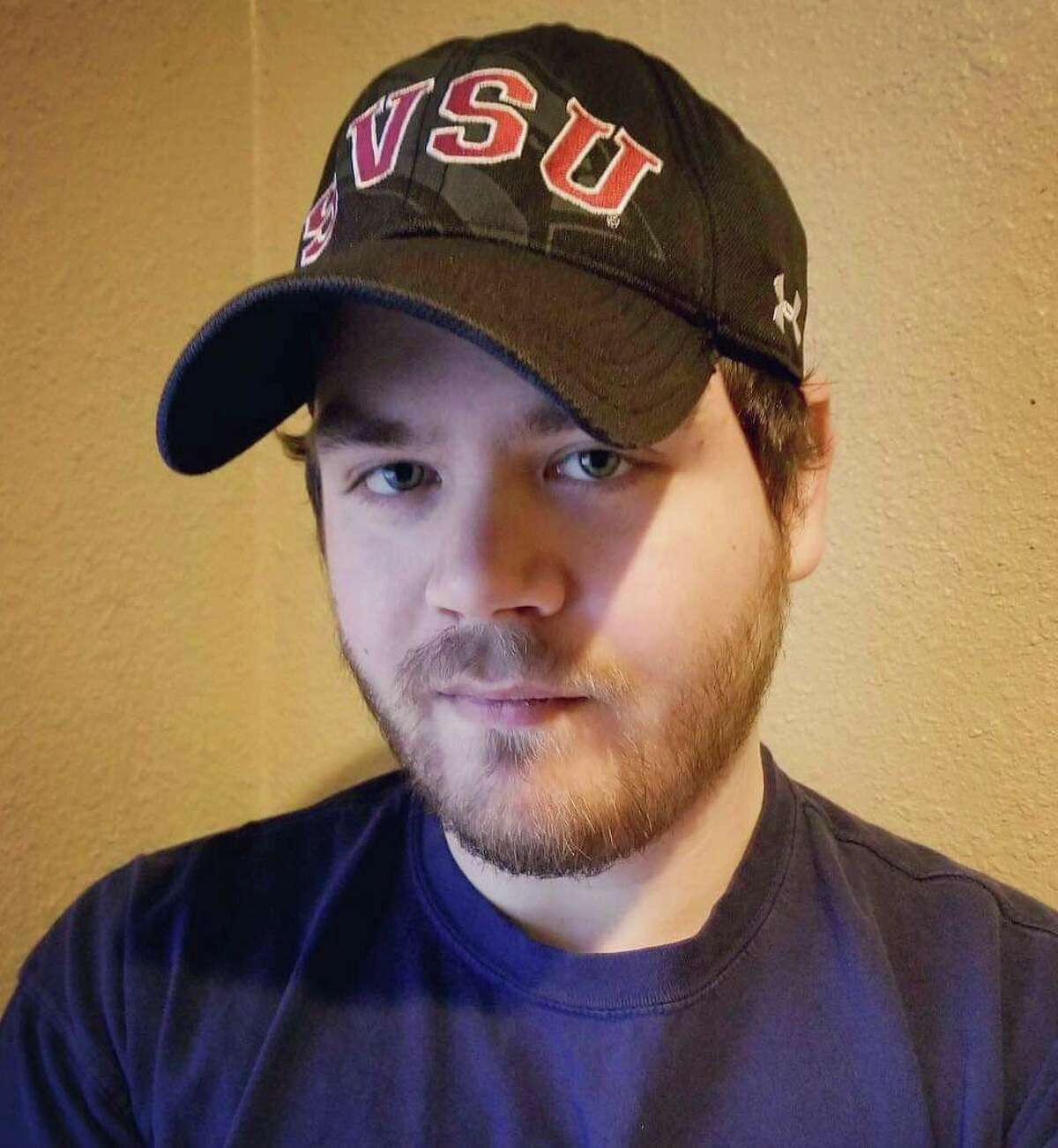Pictured is James Stahl, a criminal justice major at Saginaw Valley State University and a past president of Press Start, an SVSU student organization that hosts a variety of video game-centric events. (Photo provided)
