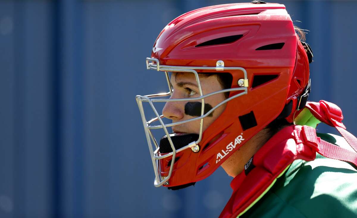 The Woodlands catcher Drew Romo (8) warms up before a non-district high school baseball game at Kingwood High School, Friday, Feb. 28, 2020, in Kingwood.