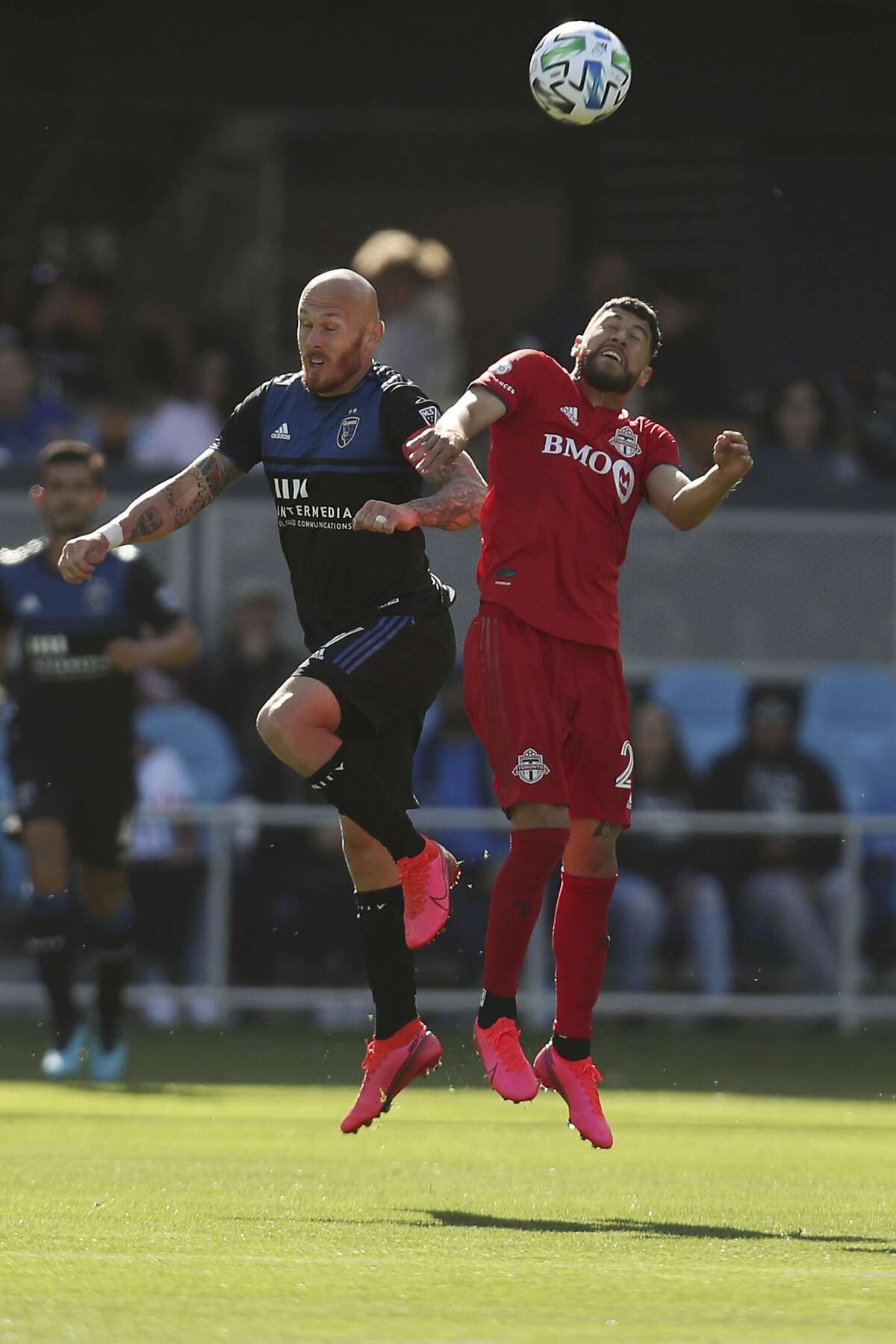 San Jose Earthquakes' Magnus Eriksson (7) battles for the ball with Toronto FC's Jonathan Osorio (23) during the first half of an MLS soccer game in San Jose, Calif., Saturday, Feb. 29, 2020. (AP Photo/Jed Jacobsohn)