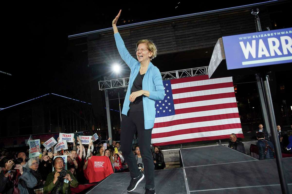 U.S. Democratic presidential candidate Elizabeth Warren laughs after giving a speech during a town hall gathering a Discovery Green in downtown Houston on Saturday, February 29, 2020.
