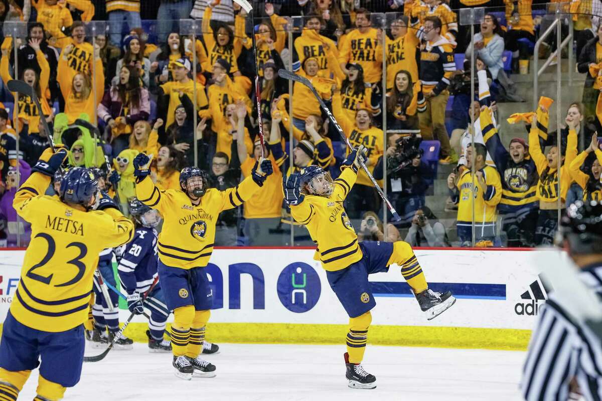 Quinnipiac players celebrate during a win over Yale this past season.