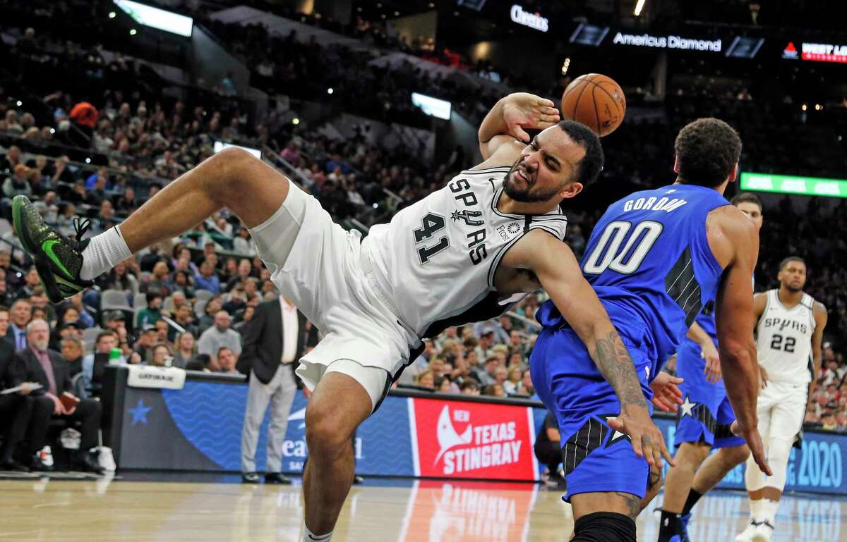 Trey Lyles #41 of the San Antonio Spurs gets and one after being found by Aaron Gordon #00 of the Orlando Magic in the second half on Saturday, February 29, 2020 at AT&T Center
