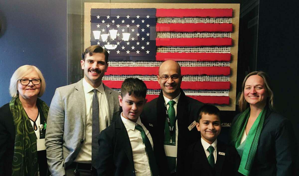 Ridgefield's Sarup family went to Washington DC to lobby for federal funds in the fight against Fragile X Syndrome. From left are grandmother Dottie Anastasia, Nicholas Larsen of Congressman Jim Himes' office, Jordan Sarup, Rajat Sarup, Ari Sarup and Stephanie Sarup.