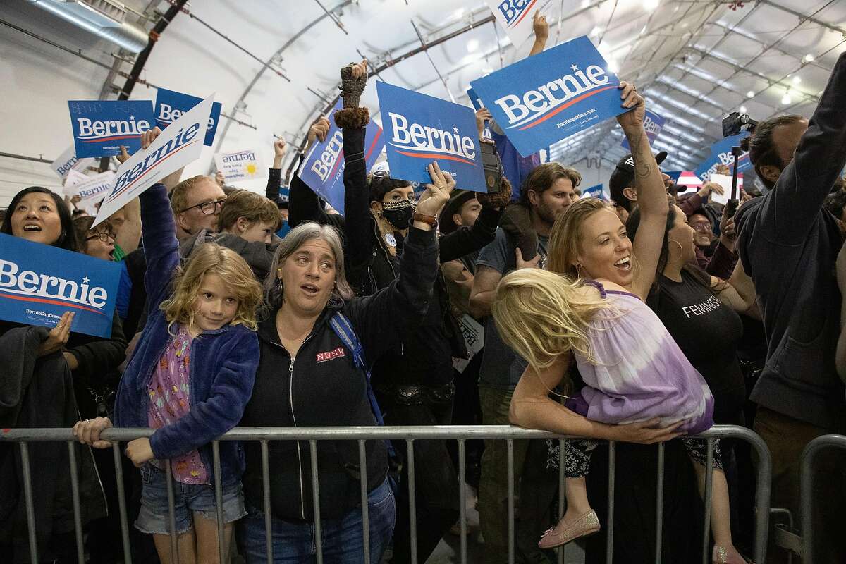 Supporters cheer as Bernie Sanders speaks to the crowd at McEnery Convention Center, South Hall, Sunday, March 1, 2020 in San Jose, Calif.