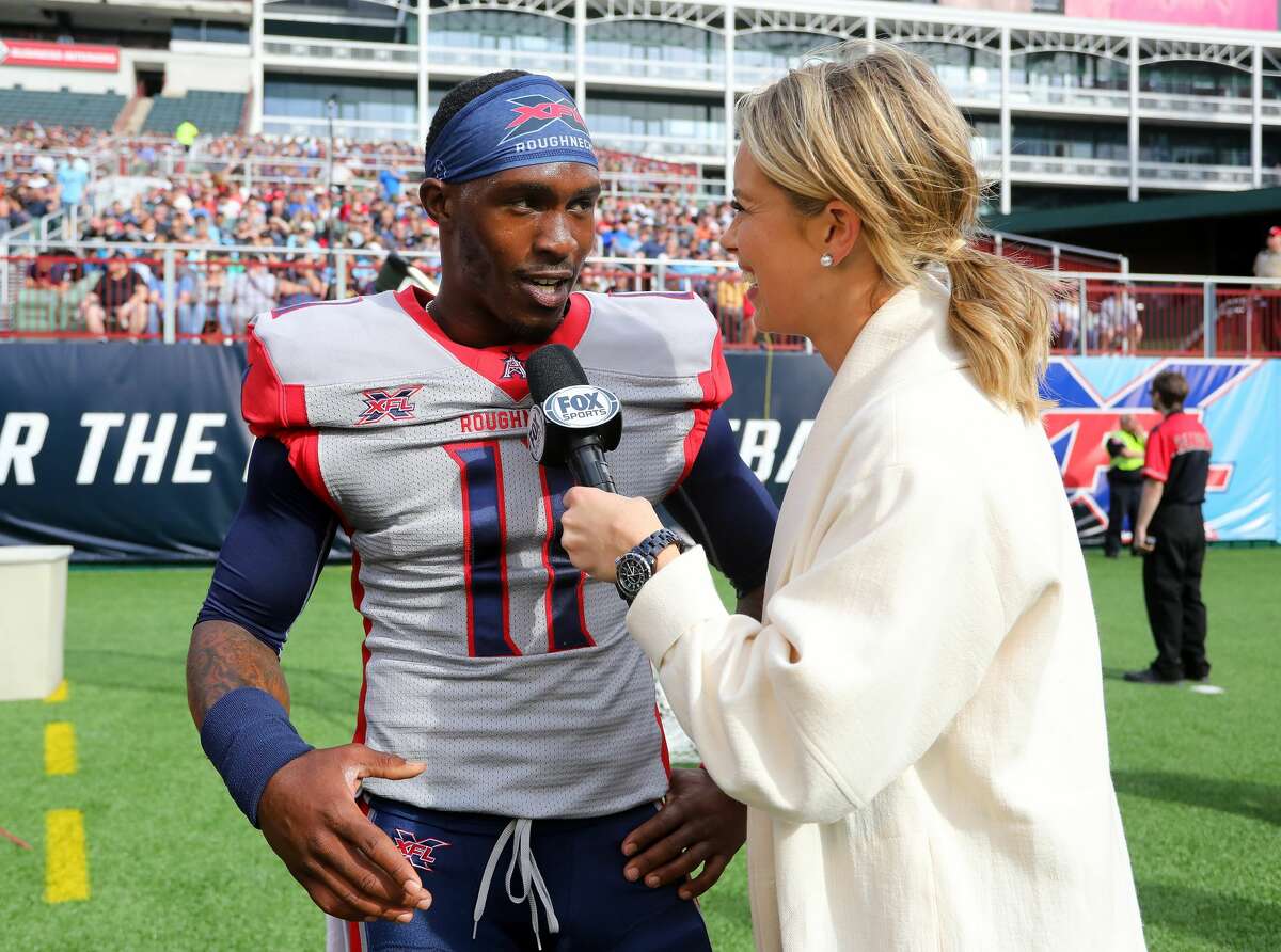 ARLINGTON, TEXAS - MARCH 01: P.J. Walker #11 of the Houston Roughnecks is interviewed by a FOX sideline reporter after a three-point conversion against the Dallas Renegades at an XFL football game on March 01, 2020 in Arlington, Texas. (Photo by Richard Rodriguez/Getty Images)