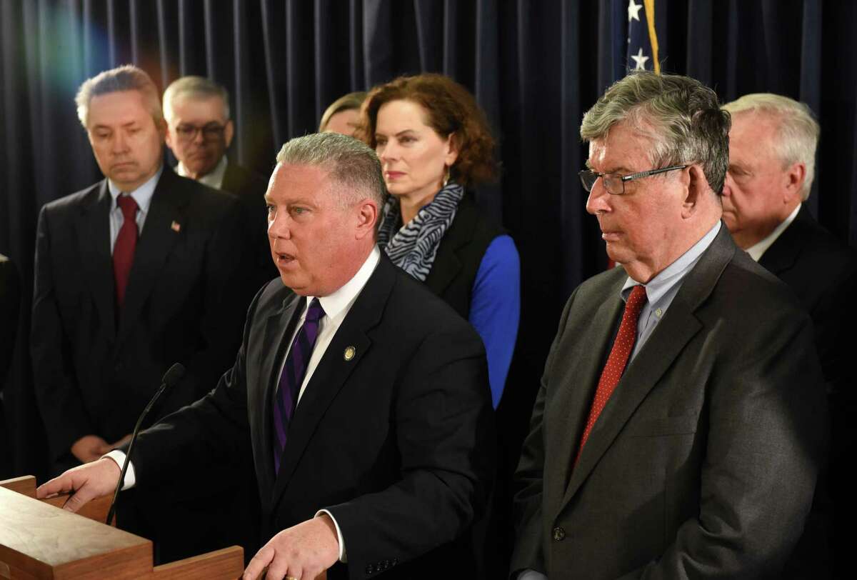 Assemblyman John T. McDonald III, center, is joined by Assembly member Patricia Fahy, and Sen. Neil Breslin, right, during a press conference to discuss legislation they are sponsoring to ban the incineration of PFAS firefighting foam on Monday, March 2, 2020, at Empire State Plaza in Albany, N.Y. PFAS PFAS compounds were being incinerated at the Norlite facility in Cohoes. The chemicals, perfluoroalkyls and polyfluoroalkyls are associated with health problems including thyroid disorders and cancer when ingested. (Will Waldron/Times Union)