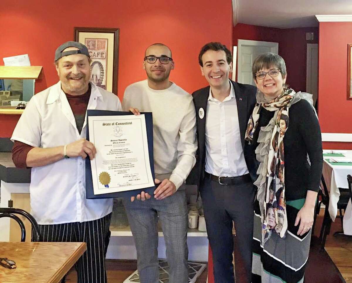 State Representative Anne Hughes honors local hero, Tom Costanzo of Tomasinos Pizza N Pasta on Long Ridge Road, for saving a stranded motorist on the West Redding Train Station tracks. Costanzo helped the man escape the vehicle right before it was struck by the train.