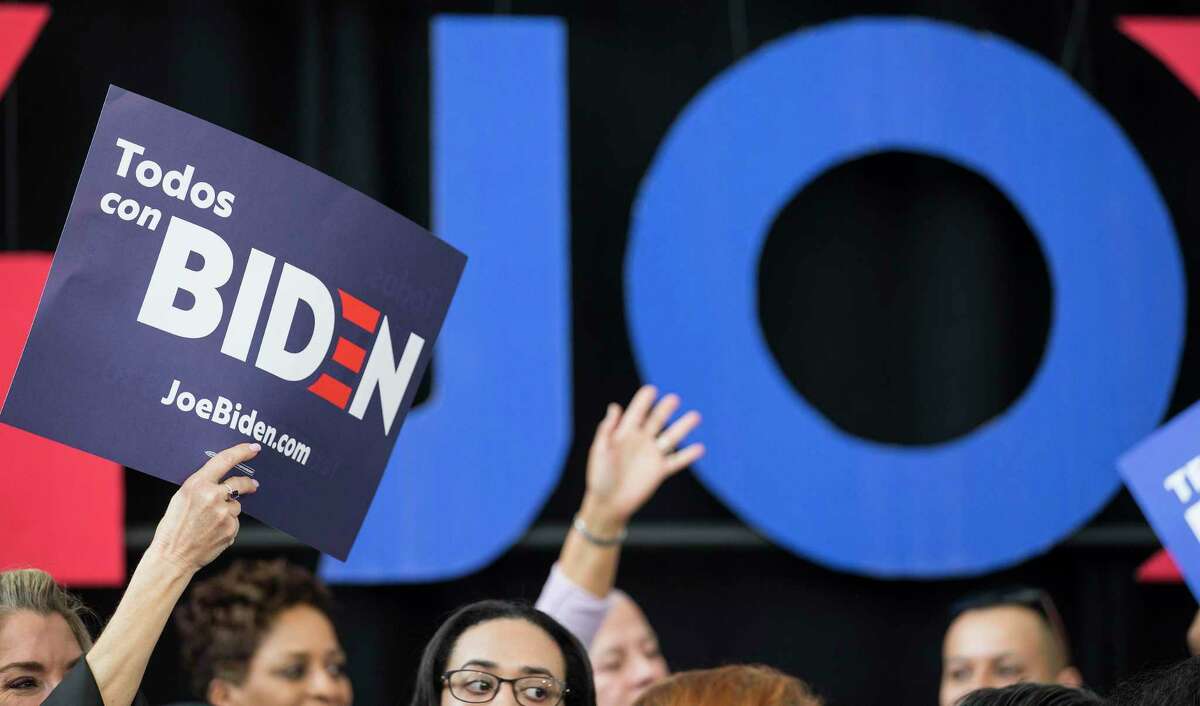 Supporters of Democratic presidential hopeful former Vice President Joe Biden cheer before he gave a campaign speech on Monday, March 2, 2020 at Texas Southern University in Houston.