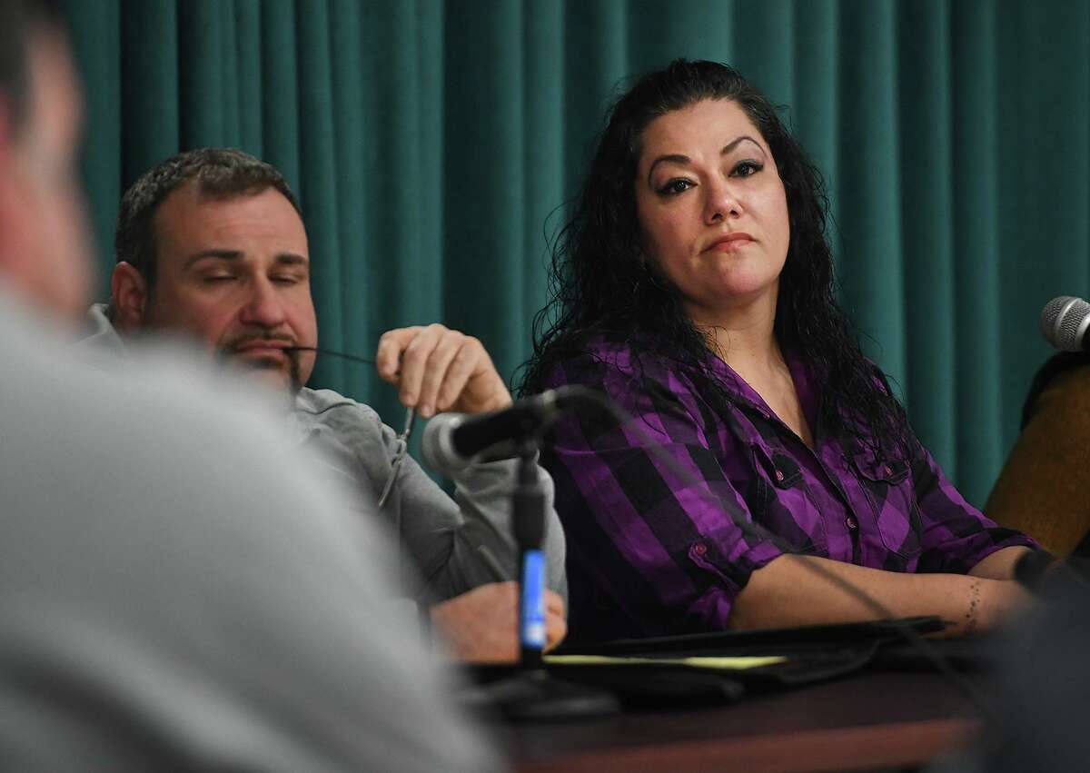 Bridgeport Board of Education Chair Jessica Martinez listens as fellow board member Chris Taylor gives his reasons for voting for her ouster during a special meeting of the board in Bridgeport, Conn. on Monday, March 2, 2020.