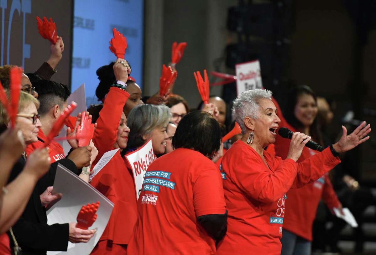 New York State Nurses Association members rally in support of law to enact safer staffing ratios on Tuesday, March 3, 2020, at the Empire State Plaza Convention Center in Albany, N.Y. Healthcare supporters also called for legislators to protect Medicaid funding and other critical healthcare funding for the state. (Will Waldron/Times Union)