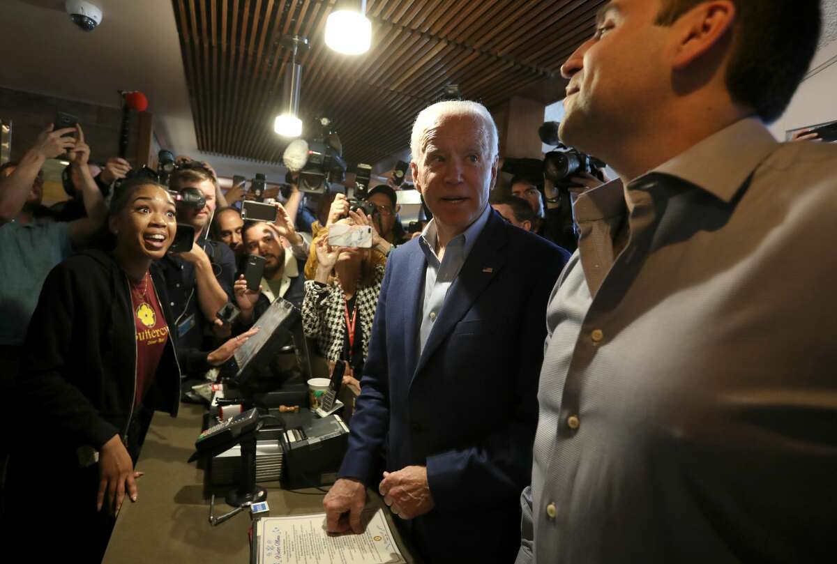 Democratic presidential candidate former Vice President Joe Biden talks with the staff at the Buttercup diner on March 03, 2020 in Oakland, California. Biden's Super Tuesday election night gathering will be held in Los Angeles.