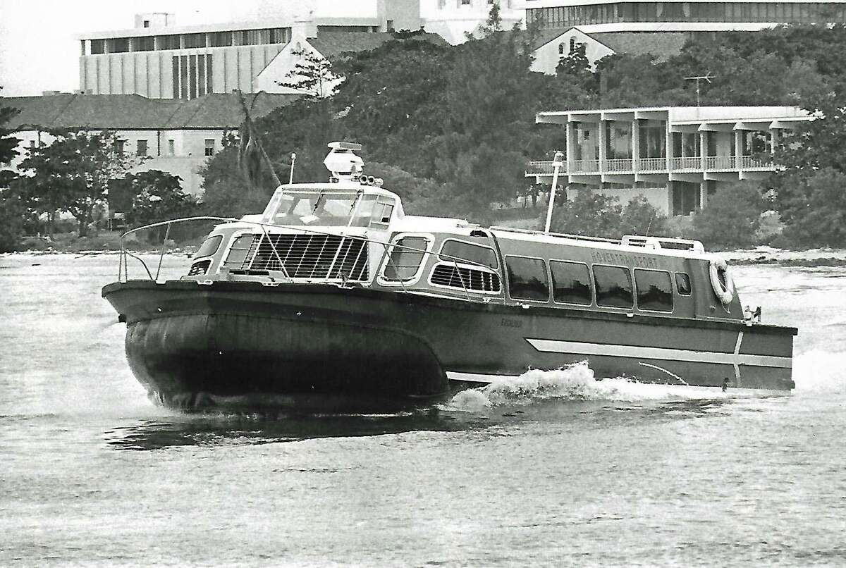 Hovercraft Excalibur flies on Miami River to Miami Seaquarium in 1976.