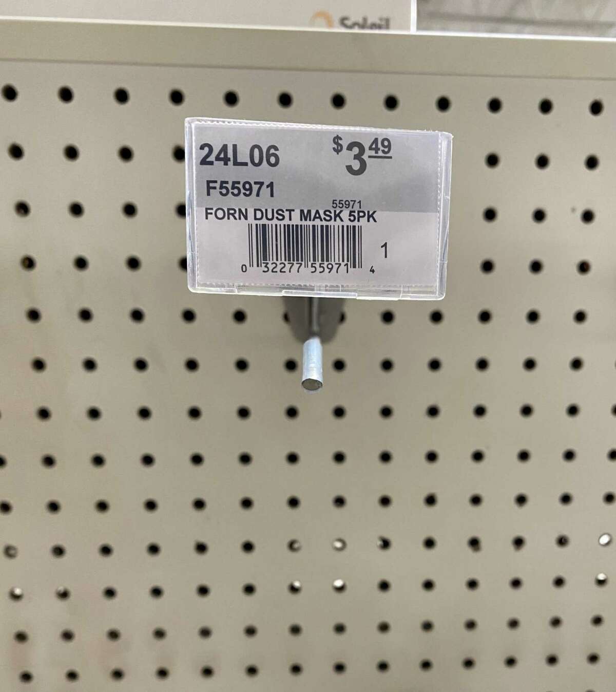 The hook for face masks is empty at Karp's Ace Hardware in Stamford due to worries about the coronavirus on Monday, March 3, 2020.