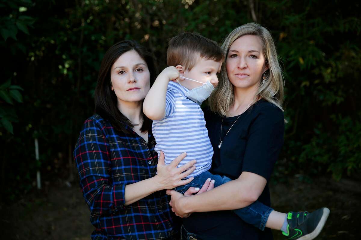 Naomi Thorne, left, Katherine Thorne, and their 2-year-old son Everett pose for a portrait at their home in Novato, California, Tuesday, March 3, 2020. The family is taking precautionary actions to ward off the novel coronavirus. Ramin Rahimian/Special to The Chronicle