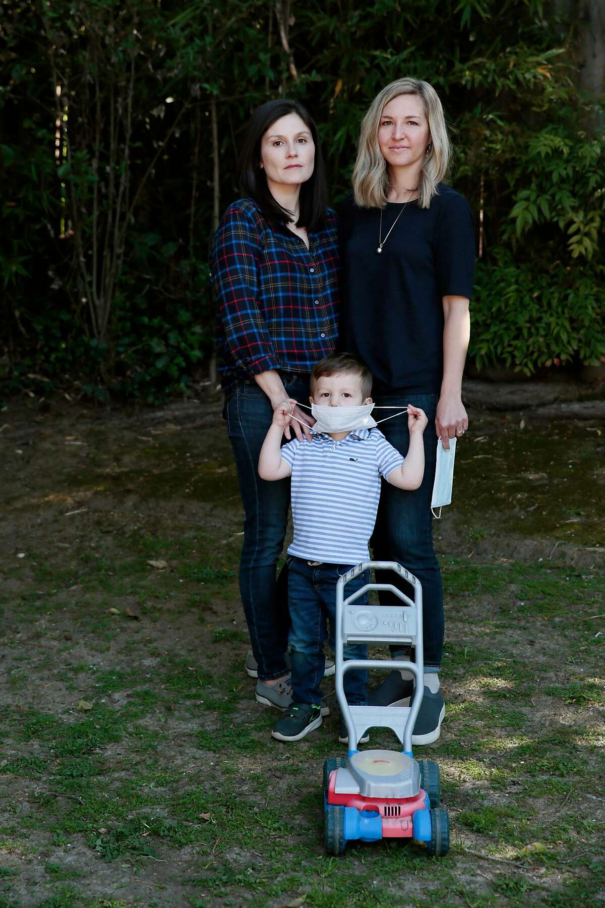 Naomi Thorne, left, Katherine Thorne, and their 2-year-old son Everett pose for a portrait at their home in Novato, California, Tuesday, March 3, 2020. The family is taking precautionary actions to ward off the novel coronavirus. Ramin Rahimian/Special to The Chronicle