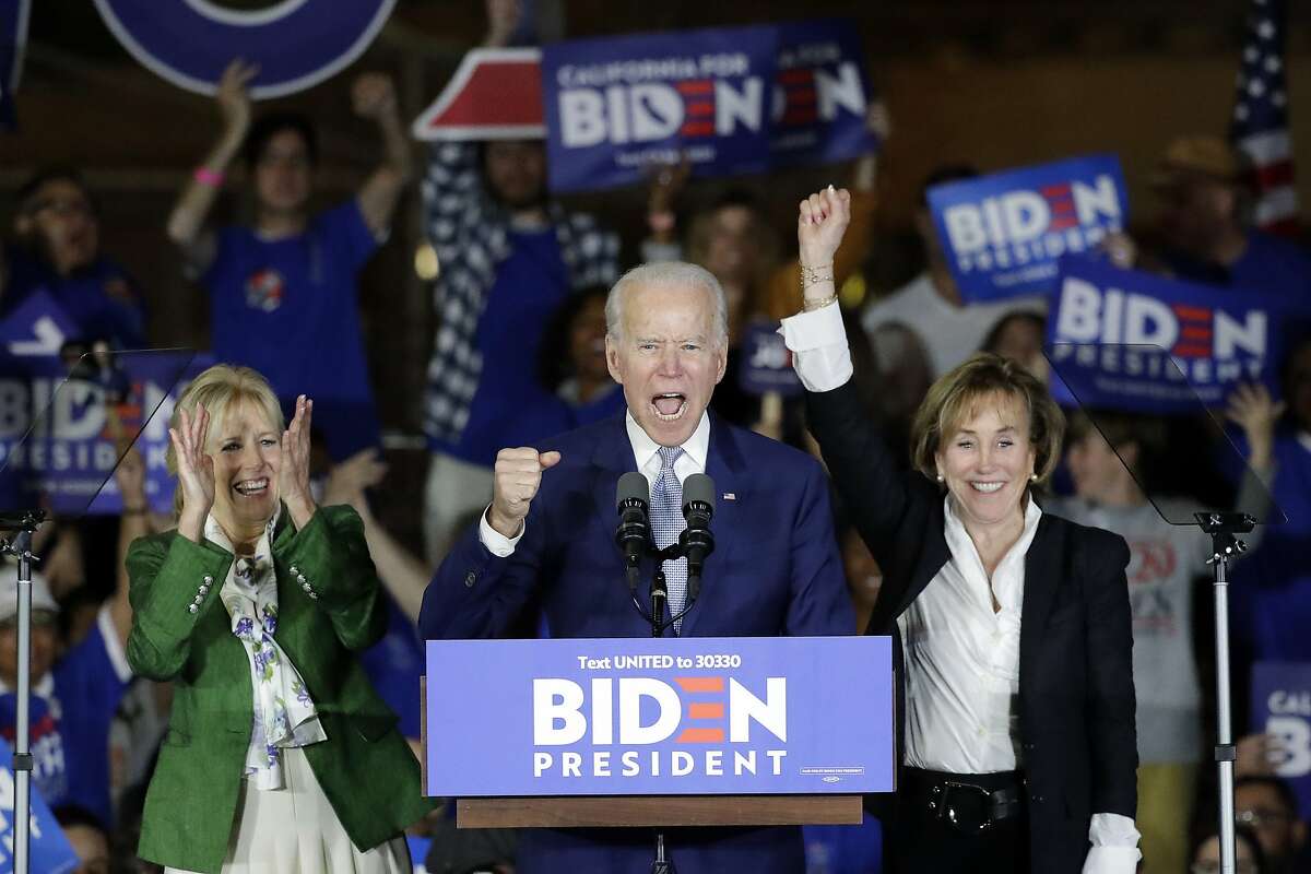 Democratic presidential candidate former Vice President Joe Biden speaks at a primary election night campaign rally Tuesday, March 3, 2020, in Los Angeles with his wife Jill Biden, left, and his sister Valerie. (AP Photo/Chris Carlson)