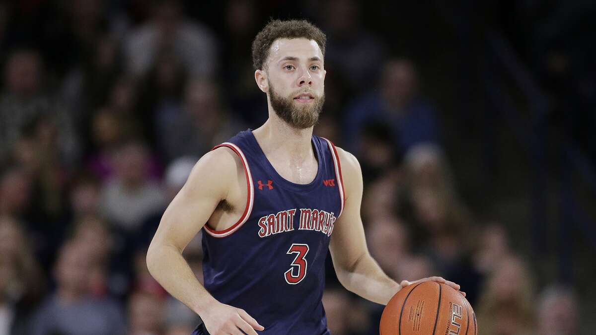 Saint Mary's guard Jordan Ford (3) brings the ball up the court during the second half of an NCAA college basketball game against Gonzaga in Spokane, Wash., Saturday, Feb. 29, 2020. (AP Photo/Young Kwak)