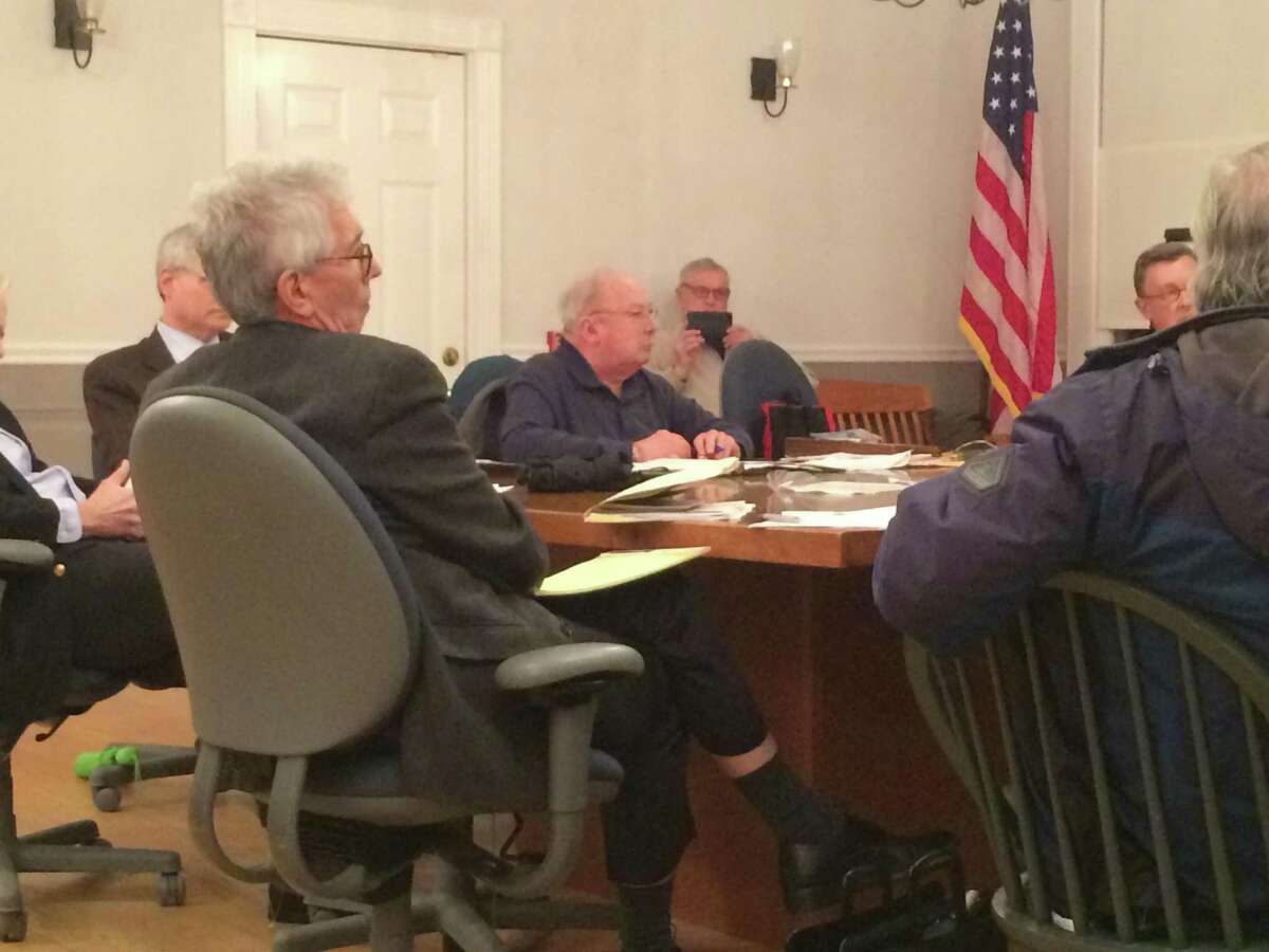 Ethics Commission Chairman Thomas Lee asks former First Selectman Tim Herbst a question during the March 3 hearing.
