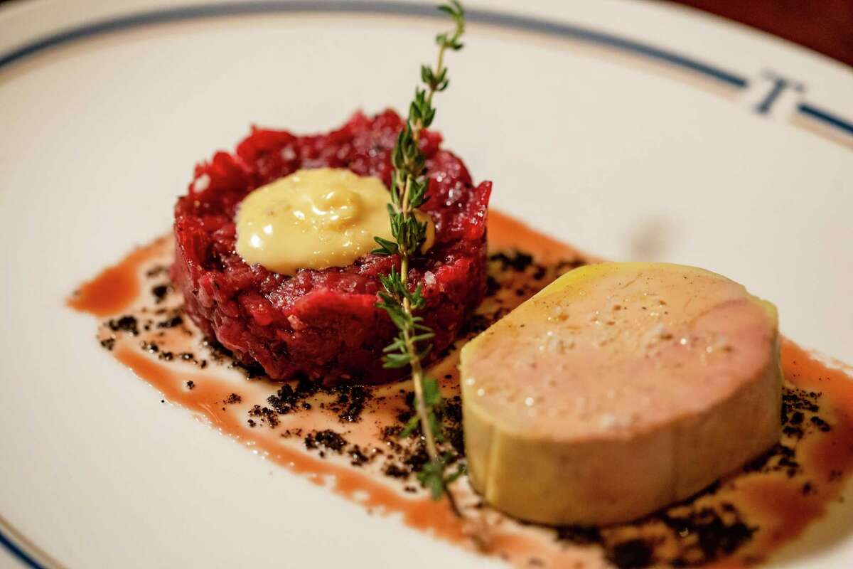 Steak tartare and foie gras torchorn with port wine syrup and mushroom dust at Turner's, a new dining concept from restaurateur Benjamin Berg, featuring a menu from James Beard Award-winning chef Robert Del Grande, at 1800 Post Oak.