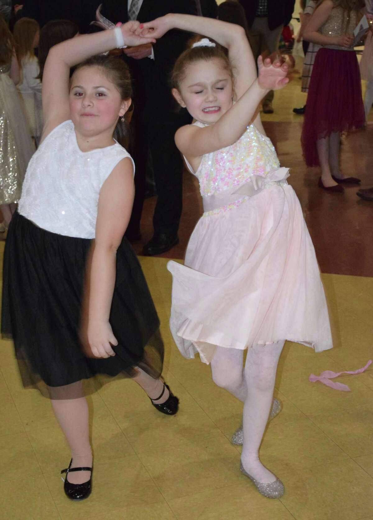 Sophia Turco, 8, left, and Jenna Panepento, 9, display their dance moves.