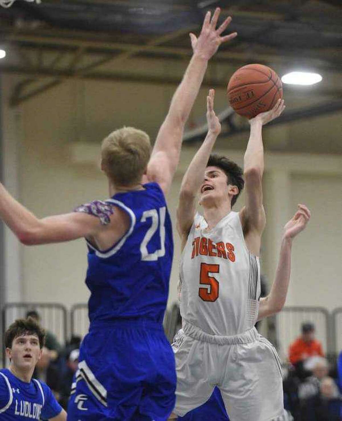 Amos Grey looks to take a shot during Ridgefield's win over Fairfield Ludlowe in the FCIAC semifinals.