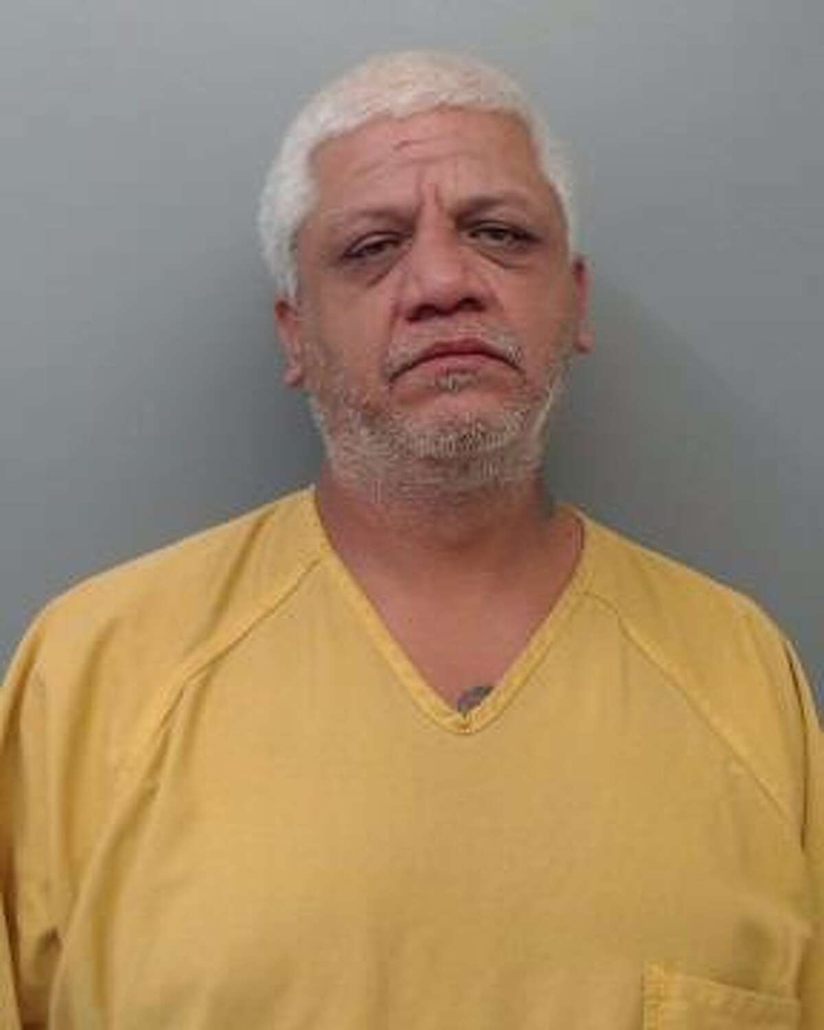 Juan Rodriguez, 48, was arrested after he was served with a warrant charging him with burglary of a habitation.