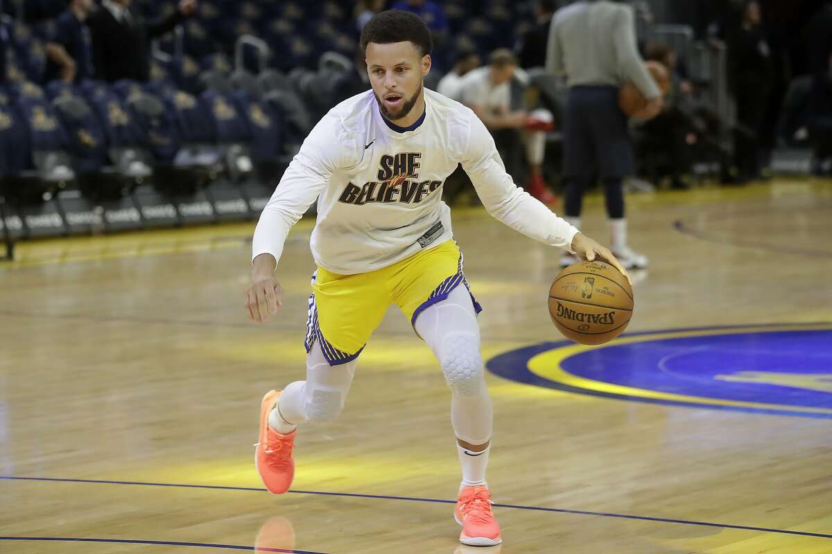 Stephen Curry of the Golden State Warriors warms up prior to Game