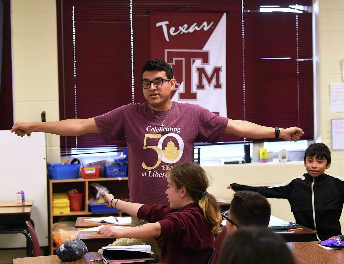 Gerardo Villegas Juarez, fifth-grade math teacher at Graebner Elementary School, teaches his students after being named a finalist in the 2020 H-E-B Excellence in Education Awards last month. "Their energy, when they understand, this is what drives me," he said. "I want to be the model of having a good attitude and what that does."