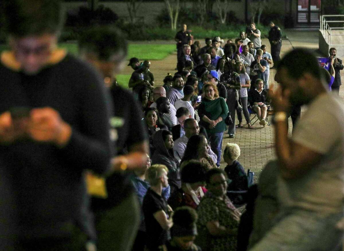 People wait in line to vote Tuesday, March 3, 2020, at Texas Southern University in Houston. (Jon Shapley/Houston Chronicle via AP)
