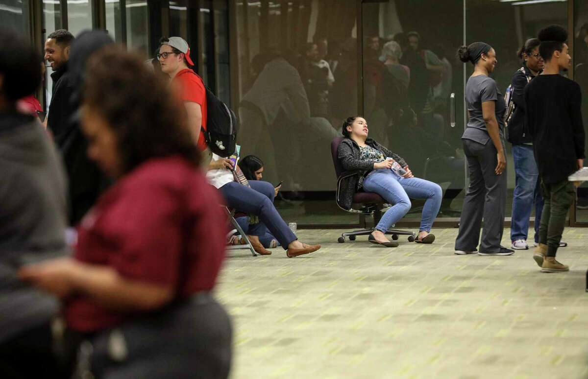 People wait in line for hours to vote Tuesday, March 3, 2020, at Texas Southern University in Houston.