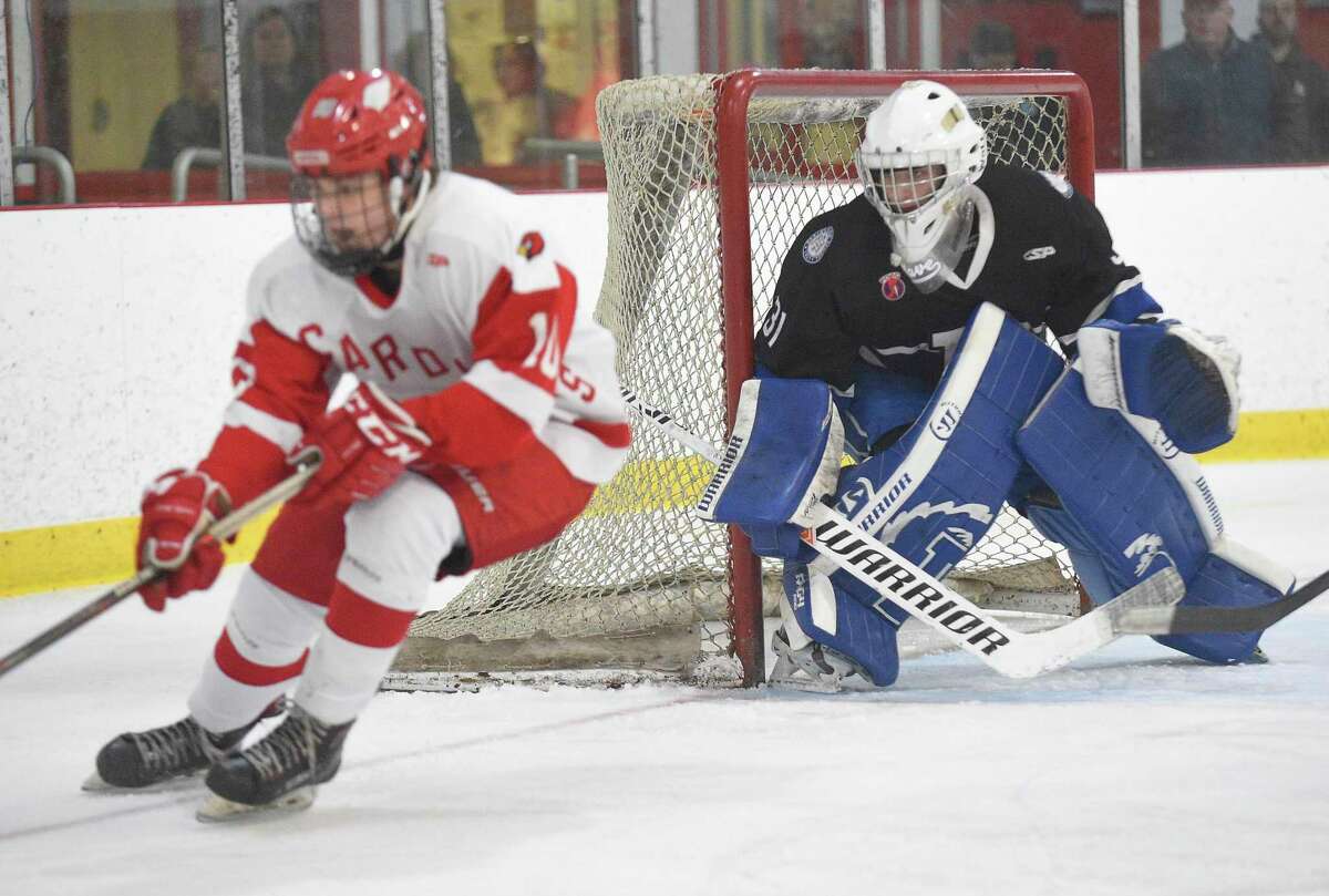 The town’s Dorothy Hamill rink, seen here in a playoff game this year between Greenwich High School and Darien, is considered to be on borrowed time. But what can the coronavirus outbreak mean for the plans to build a new rink?