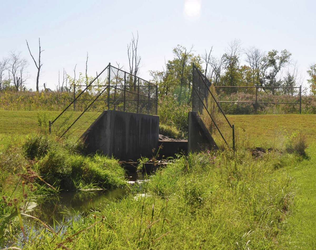The flood control dam near the Fox Hill condominiums in Ridgefield.