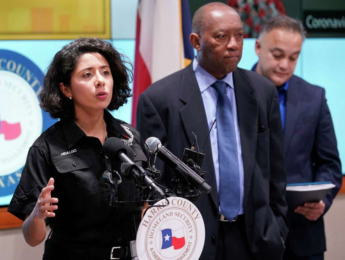 Harris County Judge Lina Hidalgo, left, speaks as Houston Mayor Sylvester Turner, and Dr. Umair Shah, executive director of Harris County Public Health, right, listen about the first two cases of coronavirus in Harris County during media conference at Houston Transtar Thursday, March 5, 2020 in Houston. One man and one woman in the unincorporated area of northwest Harris County tested positive for COVID-19, according to county officials. Both patients, and the man in Fort Bend county that tested positive for COVID-19, had traveled together to Egypt.