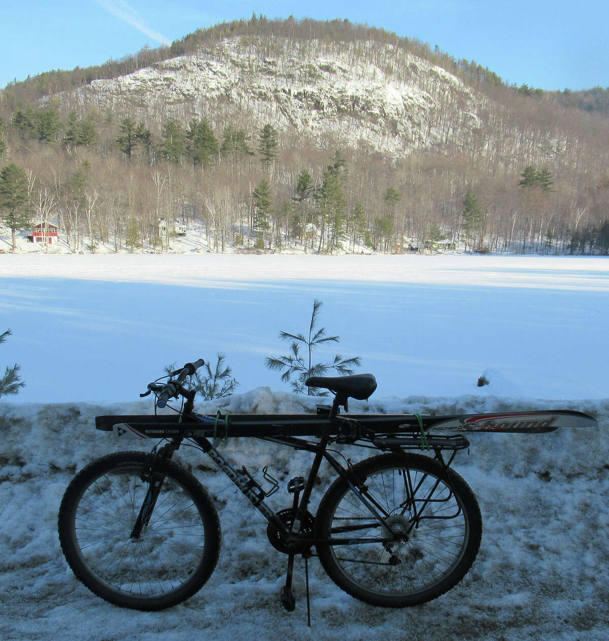 Skis on bike with Park Mountain in the Pharaoh Lake Wilderness behind. (Herb Terns / Times Union)