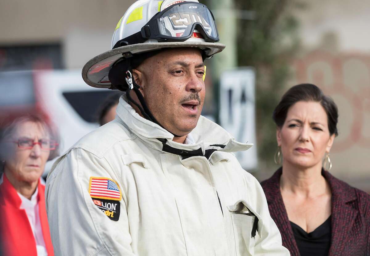 Oakland Fire Chief Darin White speaks during a press conference as crews battle a massive blaze that destroyed six apartment buildings in different phases of construction near West Grand Avenue and Filbert Street in Oakland, Calif. Tuesday, Oct. 23, 2018.