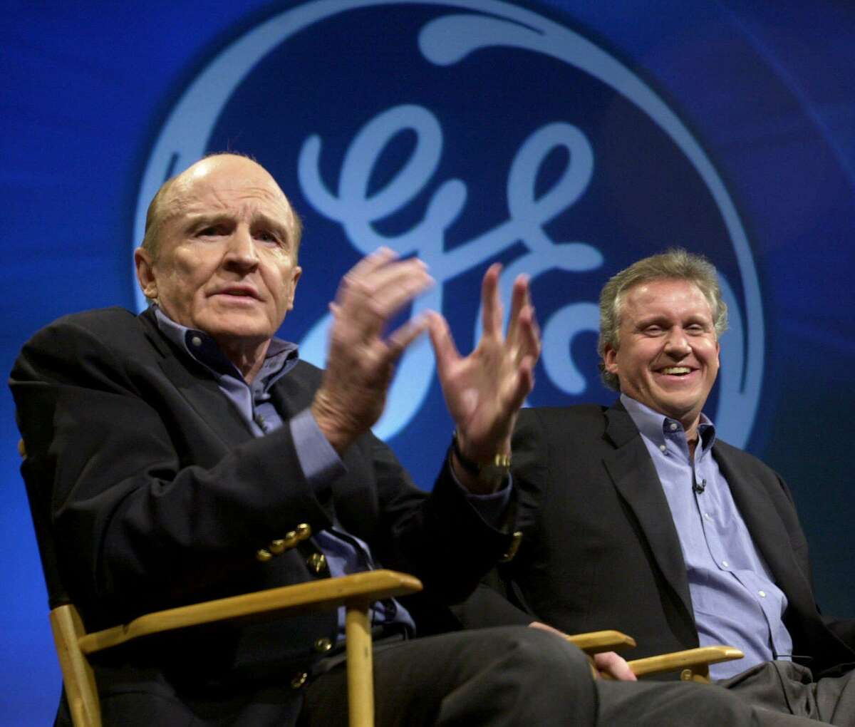 General Electric CEO Jack Welch, left, speaks during a news conference Monday, Nov. 27, 2000, in New York, as Jeff Immelt looks on.
