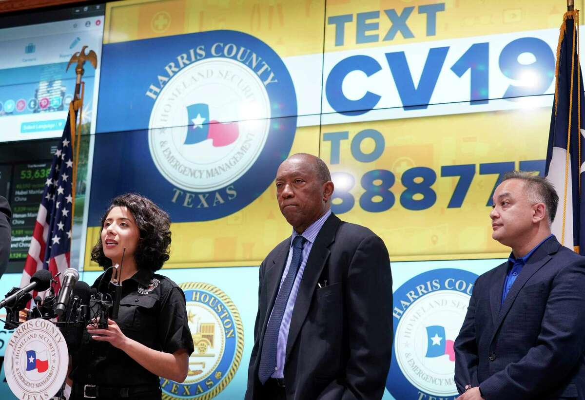 Harris County Judge Lina Hidalgo, left, speaks as Houston Mayor Sylvester Turner, and Dr. Umair Shah, executive director of Harris County Public Health, right, listen about the first two cases of coronavirus in Harris County during media conference at Houston Transtar Thursday, March 5, 2020 in Houston. One man and one woman in the unincorporated area of northwest Harris County tested positive for COVID-19, according to county officials. Both patients, and the man in Fort Bend county that tested positive for COVID-19, had traveled together to Egypt.