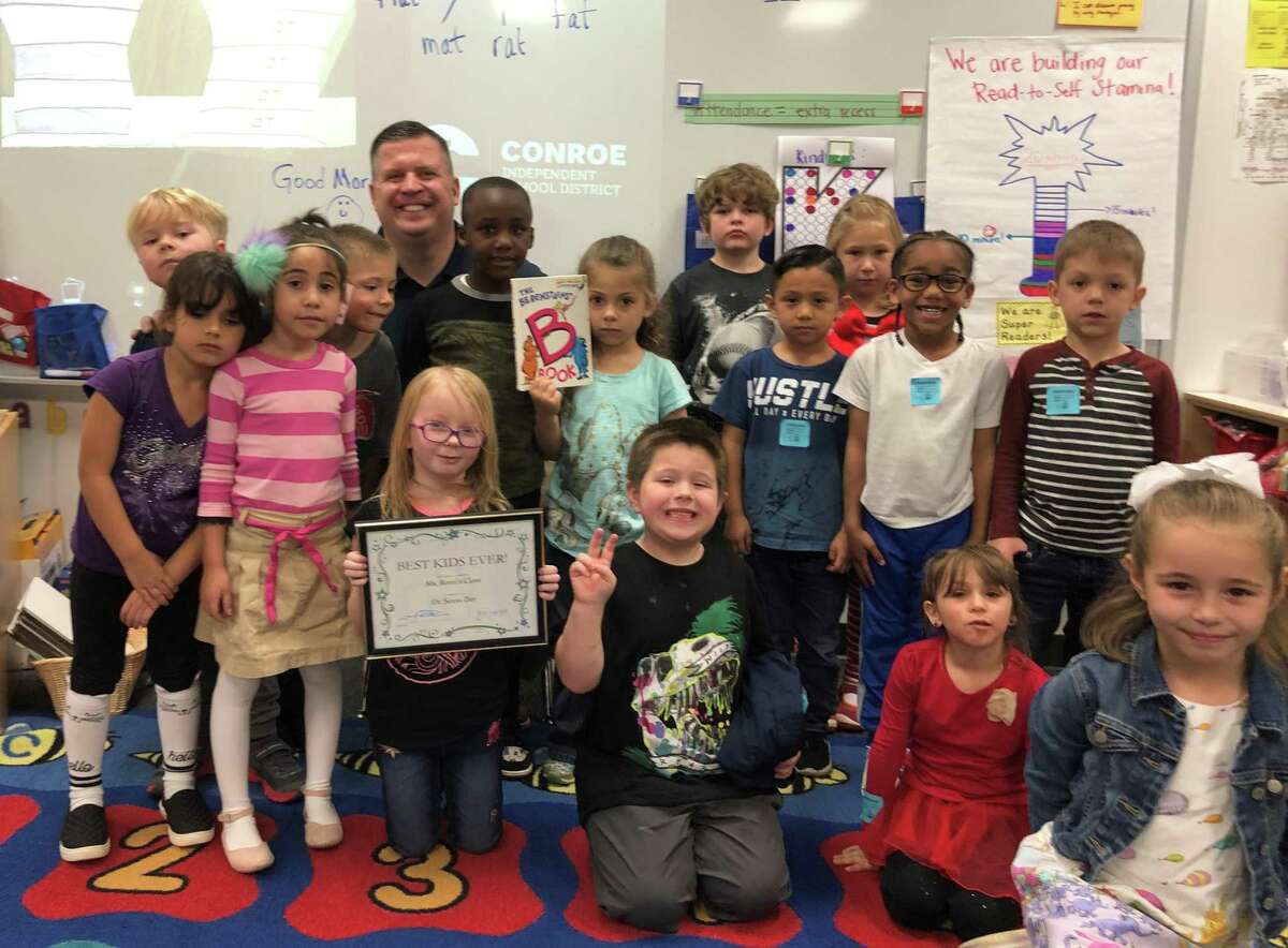 Members of the Conroe Noon Lions Club participated in the annual ‘Reading Across America’; by reading to ALL the classes at their adopted school - Reaves Elementary. Pictured in background, Lion Warner Phelps, who honored his class as ‘Best Kids Ever’.