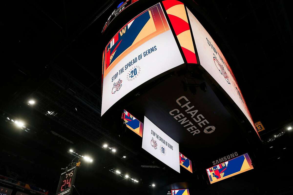 The Chase Center video boards show a message advising fans to wash their hands for 20 seconds before Golden State Warriors played Toronto Raptors in NBA game at Chase Center in San Francisco, Calif., on Thursday, March 5, 2020.