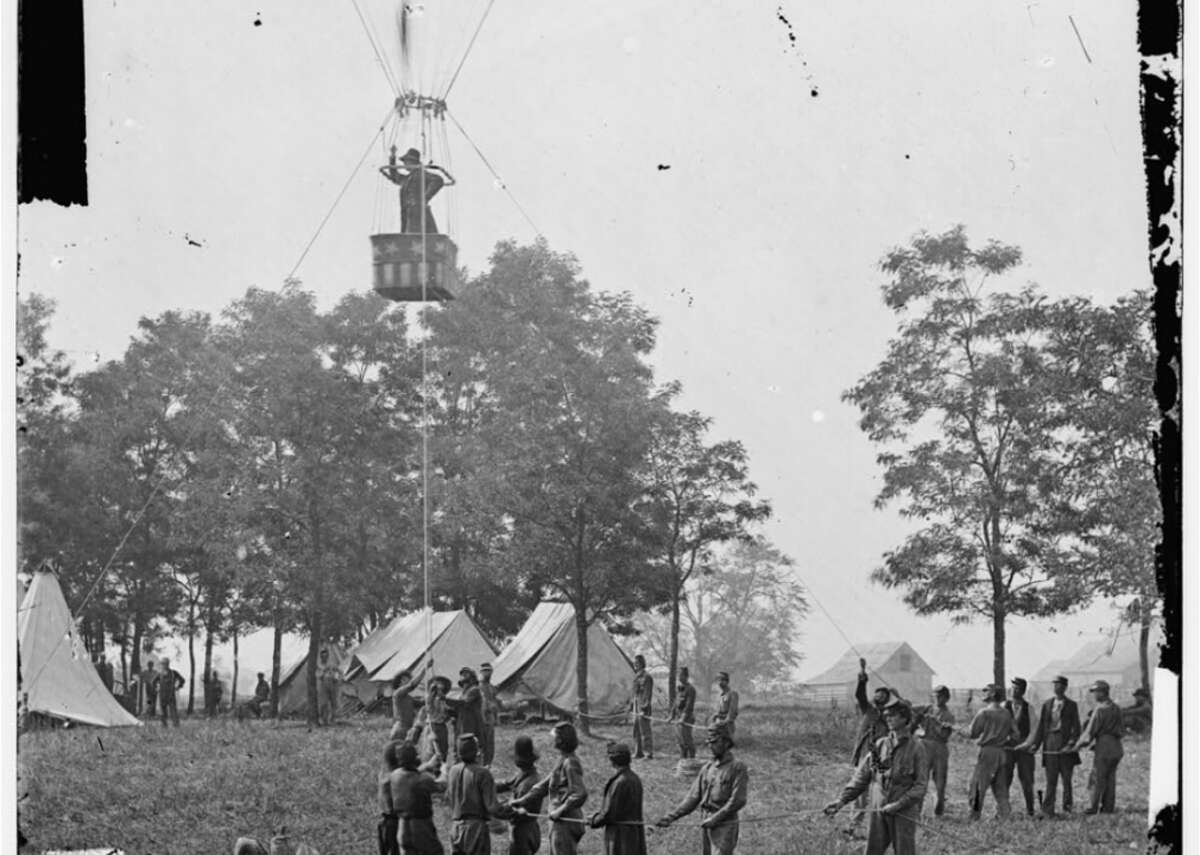 Observation balloons - First flight: pre-WWI - Manufacturer: multiple companies The origins of aerial reconnaissance and intelligence date to pre-World War I combat with the use of observation balloons. In the Civil War, the Union Army Balloon Corps began surveying battlefields from above, and by the first World War, ballooning had reached its apex; over 100 balloon companies existed, and the other Allies and Germany incorporated their own. [Pictured: View of balloon ascension. Prof. Thaddeus Lowe observing the Battle of Seven Pines or Fair Oaks from his balloon "Intrepid" on the north side of the Chickahominy River in Virginia.]