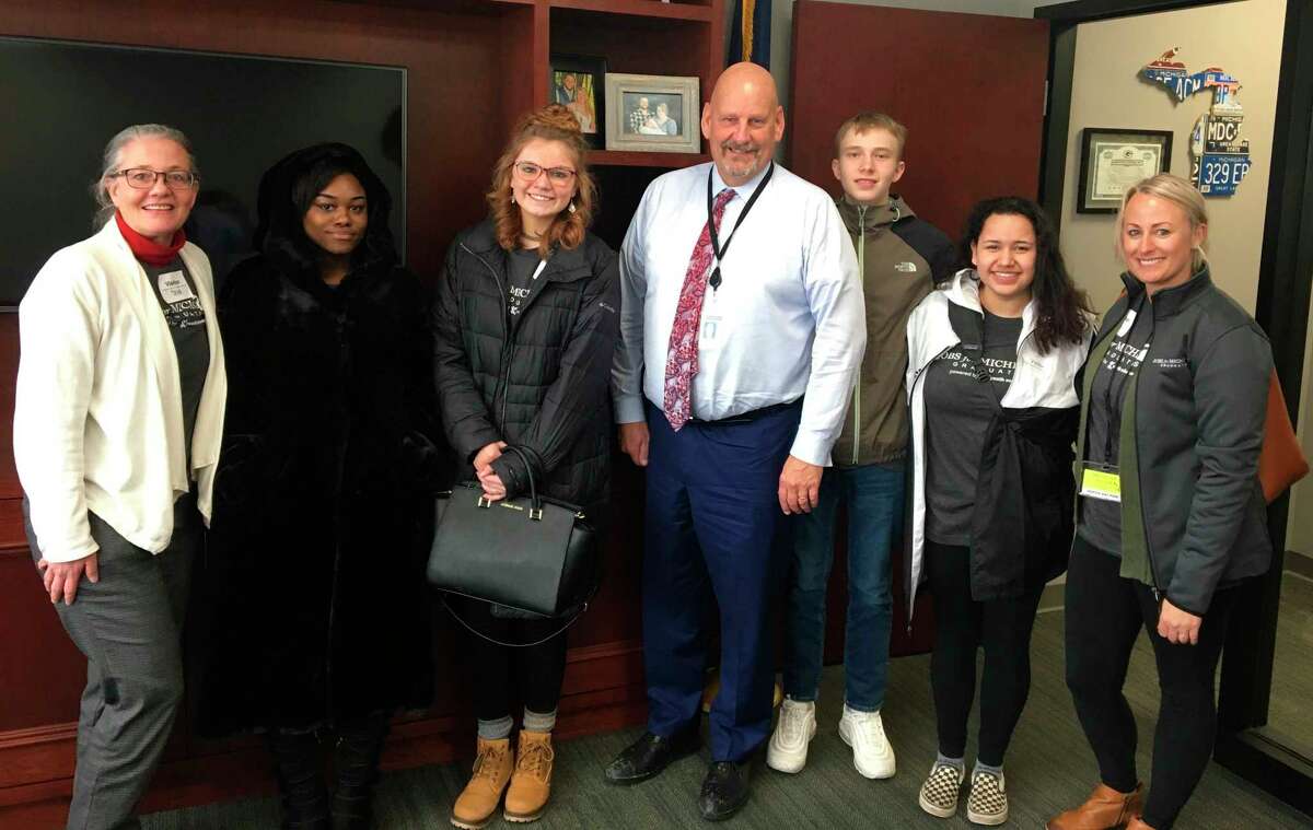 CASMAN Academy student Jessey Abrom was part of a Jobs for Michigan Graduates (JMG) students and staff members who met with State Sen. Curt VanderWall at the JMG Legislative Day in Lansing. (Courtesy photo)